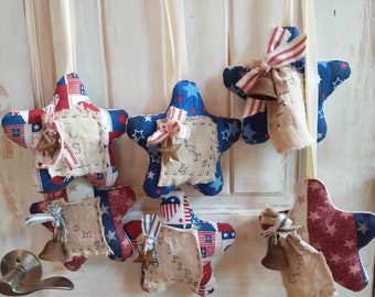 Dúo estrella de telas americanas: etiqueta estampada y decoración de campana oxidada