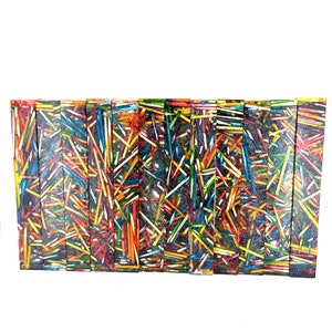 May include: A set of 10 colourful resin blanks with a random mix of multi-coloured sticks embedded in the resin. The blanks are approximately 1.25 cm thick and 2.5 cm wide.