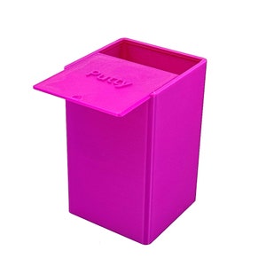 May include: A bright pink plastic container with a hinged lid. The lid has the word "putty" printed on it.