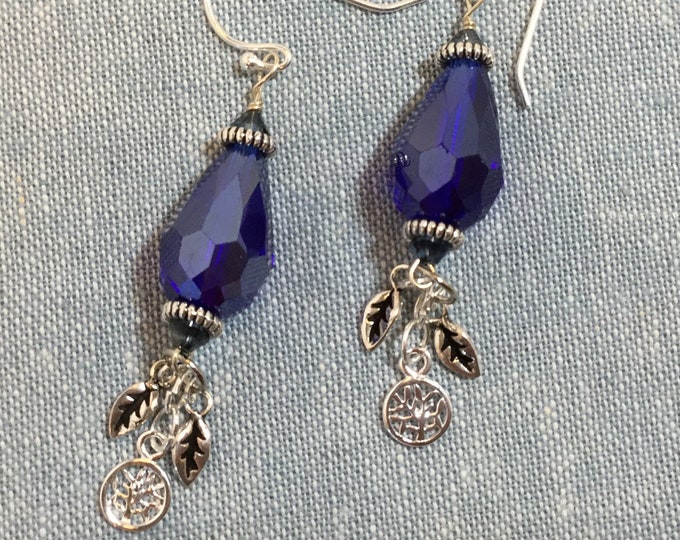 Blue Dangle earrings with tree of life symbols and feathers