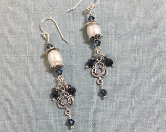 White pearl dangles with celtic charm and sapphires