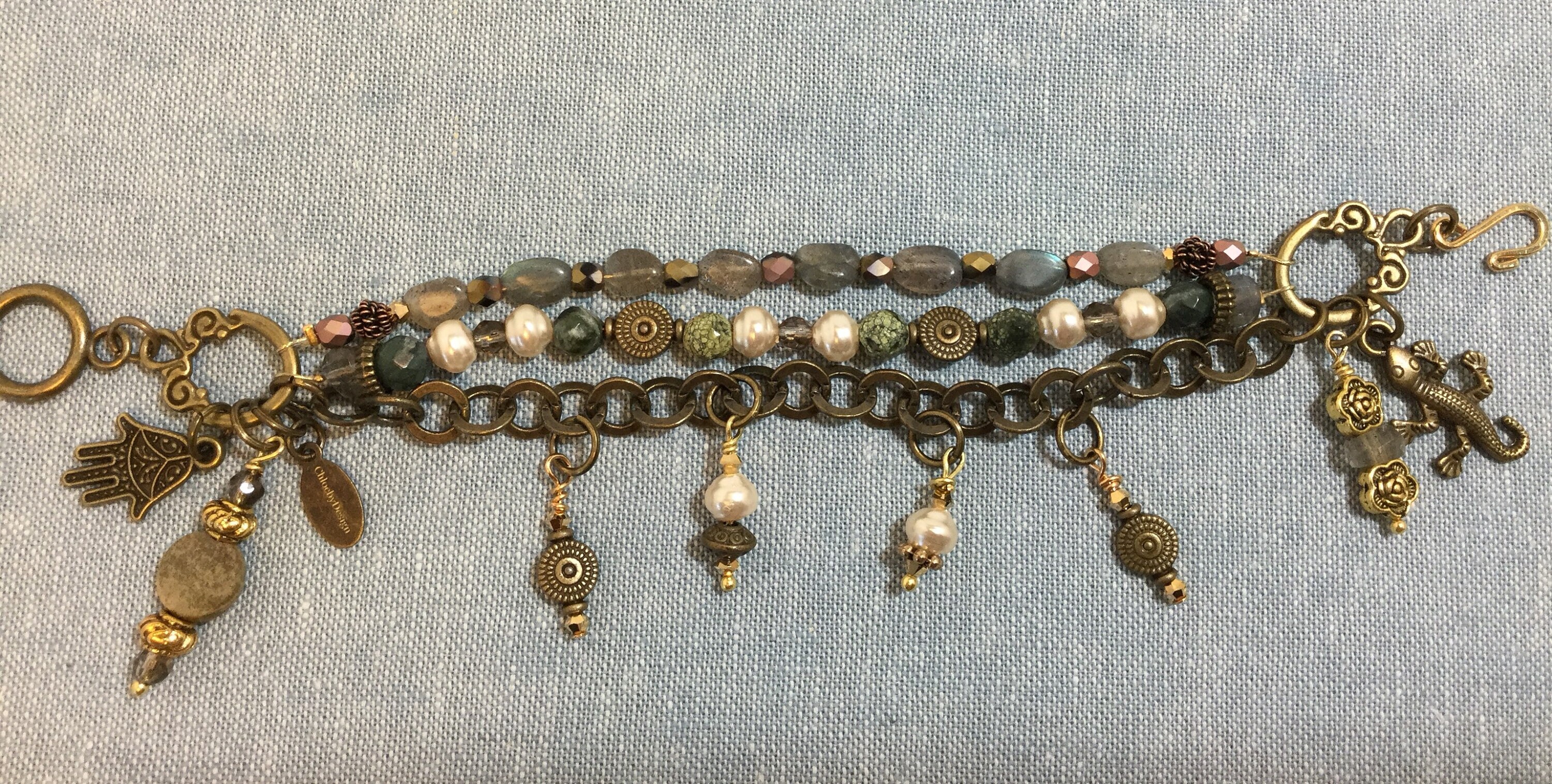 Triple strand charm bracelet with Russian serpentine and labradorite