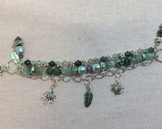 Triple strand charm bracelet with aquamarine, African turquoise, and pearls