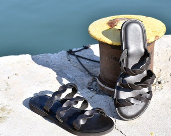 black leather woman flat sandal