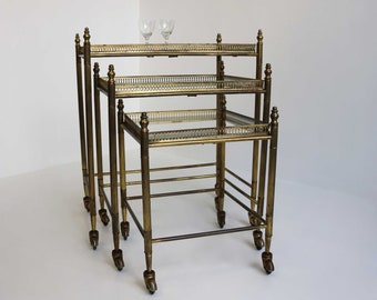 Beautiful Hollywood Recency Nesting Tables Maison Jansen style Side Tables 3 Set Mobile Nesting Tables Brass With Clear Glass Eye Catcher