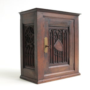 Antique Carved Wooden Wall Cabinet: French Gothic Revival, 19th Century