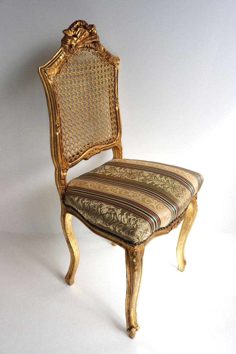 couplepair Midcentury decorative wooden gold painted woodcarvedchairs webbing back french louis style