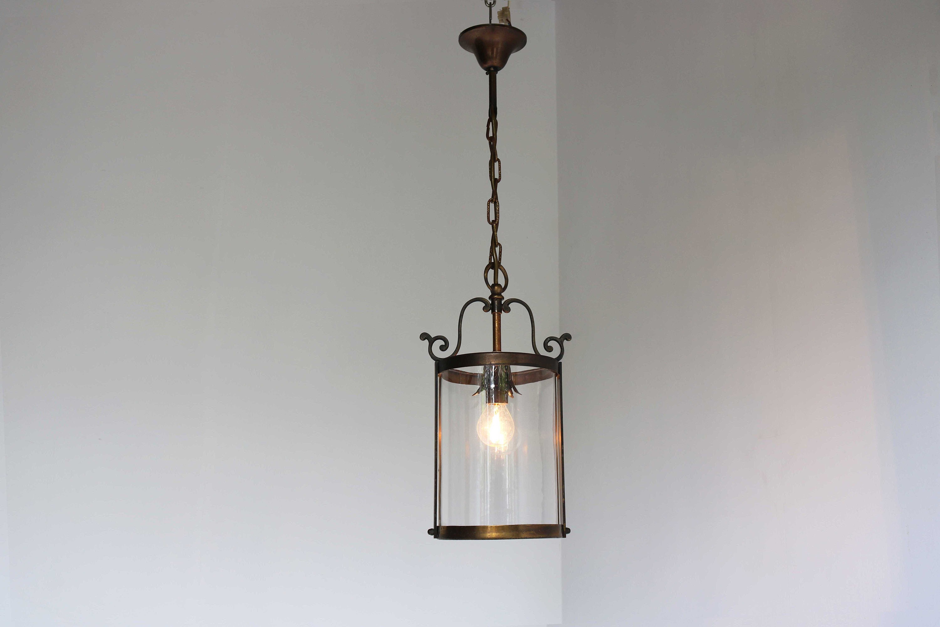 ANTIQUE BRASS GLASS CYLINDER HANGING LIGHT