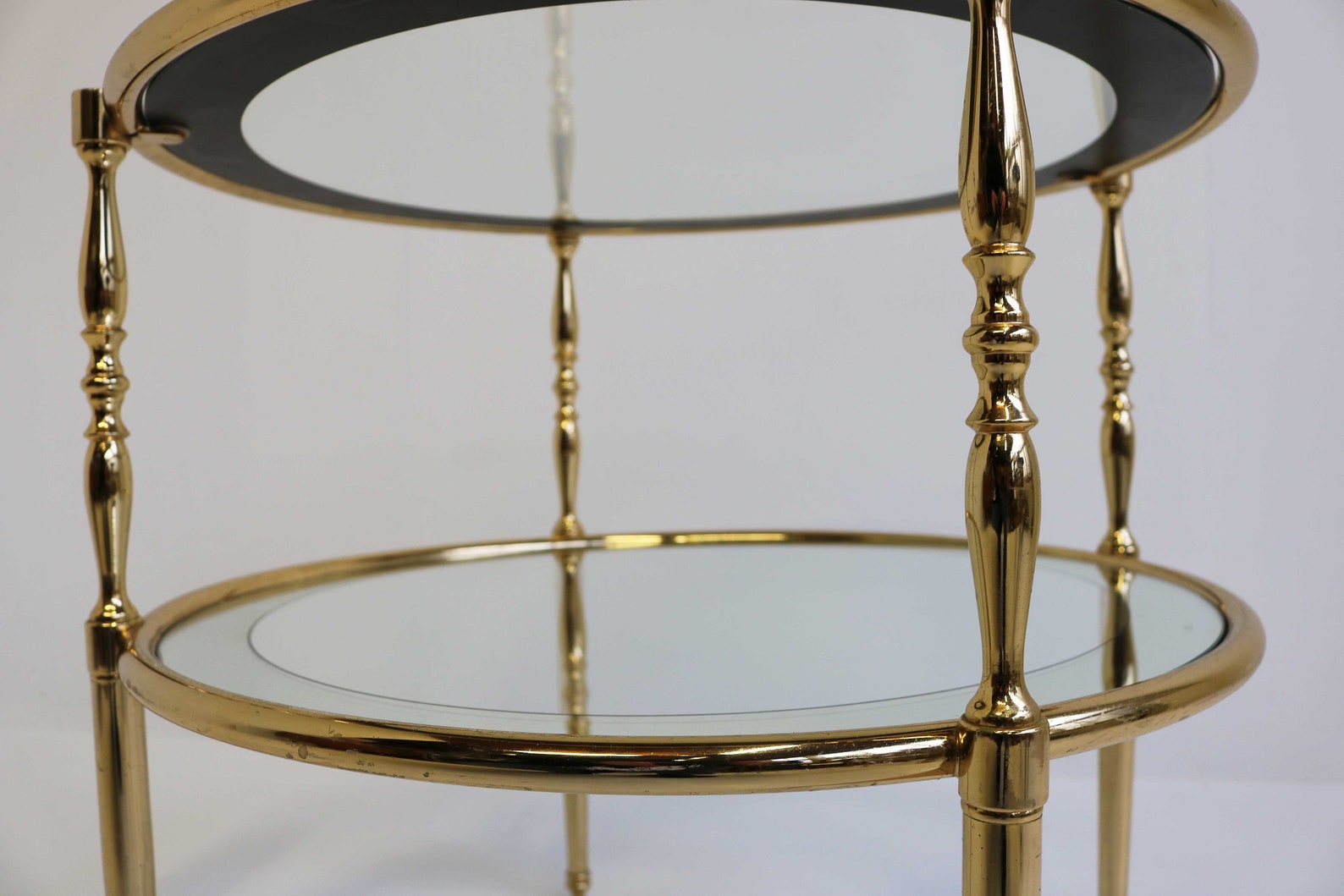Round Brass Side Table With Glass Shelves Surrounded by a - Etsy