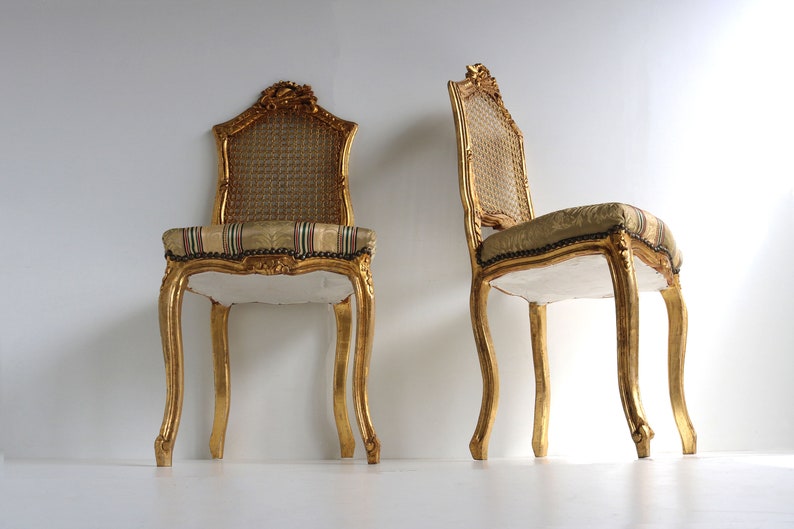 couplepair Midcentury decorative wooden gold painted woodcarvedchairs webbing back french louis style