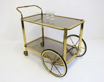 Hollywood Regency Serving Trolley vintage Bar Cart Cocktail Entertainment Beverages Tea Cart Mid Century Brass Side Table Smoked Glass 1960