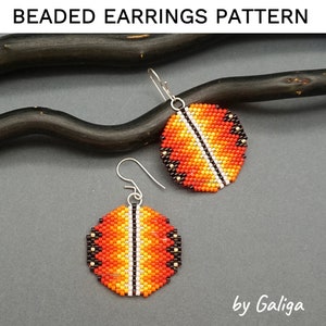 May include: A pair of beaded earrings with a geometric pattern in shades of orange, yellow, white, and black. The earrings are made with small seed beads and have silver hooks.