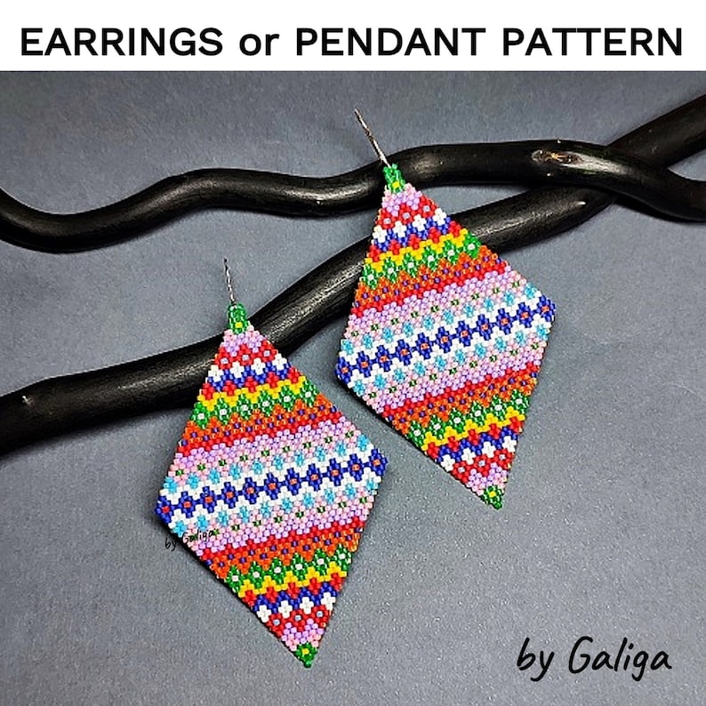 May include: A pair of colorful diamond-shaped earrings or pendants made with seed beads. The earrings are made with a variety of colors, including red, orange, yellow, green, blue, and pink. The earrings are strung on silver wires. The earrings are on a black branch.