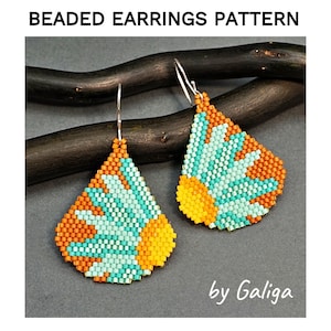 May include: A pair of beaded earrings with a geometric design in shades of orange, yellow, and turquoise. The earrings are hanging from silver hooks and are displayed against a dark wooden background. The text "by Galiga" is visible in the bottom right corner of the image.