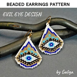 May include: A pair of beaded earrings featuring a white, blue, black and gold evil eye design. The earrings are teardrop shaped and have gold hooks.