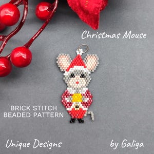 May include: Beaded Christmas mouse ornament pattern in red, white and grey. The mouse is wearing a Santa hat and holding a star. The pattern is called "Brick Stitch Beaded Pattern" and is by "Unique Designs by Galiga".