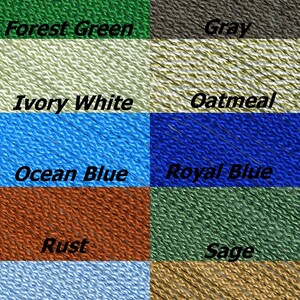 May include: A color chart of 12 different colors of macrame cord. The colors are: Almond, Cinnamon, Forest Green, Gray, Ivory White, Oatmeal, Ocean Blue, Royal Blue, Rust, Sage, Sky Blue, Tan, Turquoise, and White.