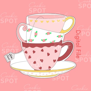 May include: A stack of three pink teacups with floral and heart patterns, a white saucer, and a tea bag tag that says "Tea Time".