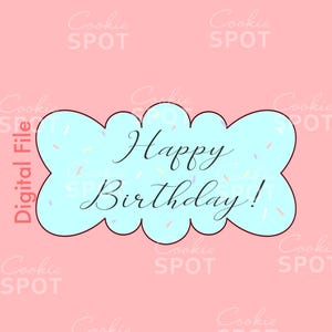 May include: A blue and white cookie cutter shaped like a cloud with the text "Happy Birthday!" and sprinkles on it. The background is pink with the text "Cookie Spot" repeated.