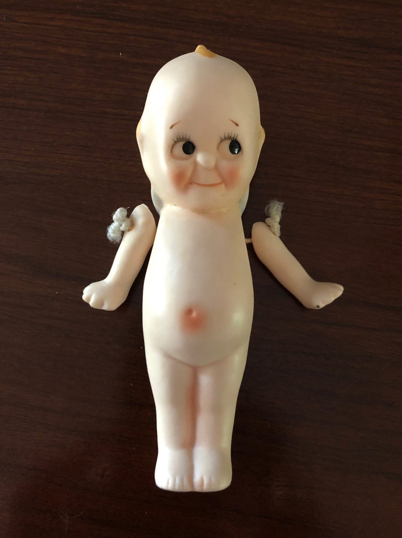porcelain kewpie doll