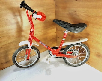 Vintage Italian Red Children's Bicycle: Retro Collectible