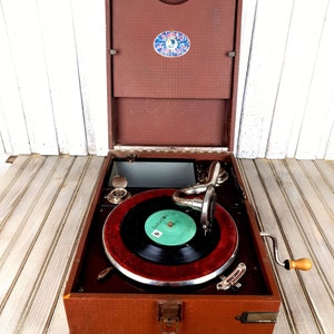 Vintage Gramophone: Antique Portable Record Player with Built-in Funnel