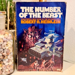 Obra maestra de ciencia ficción, invasión alienígena, aventuras de ciencia ficción. El número de la bestia - Heinlein; ilustrado; primera edición de Fawcett, 1980