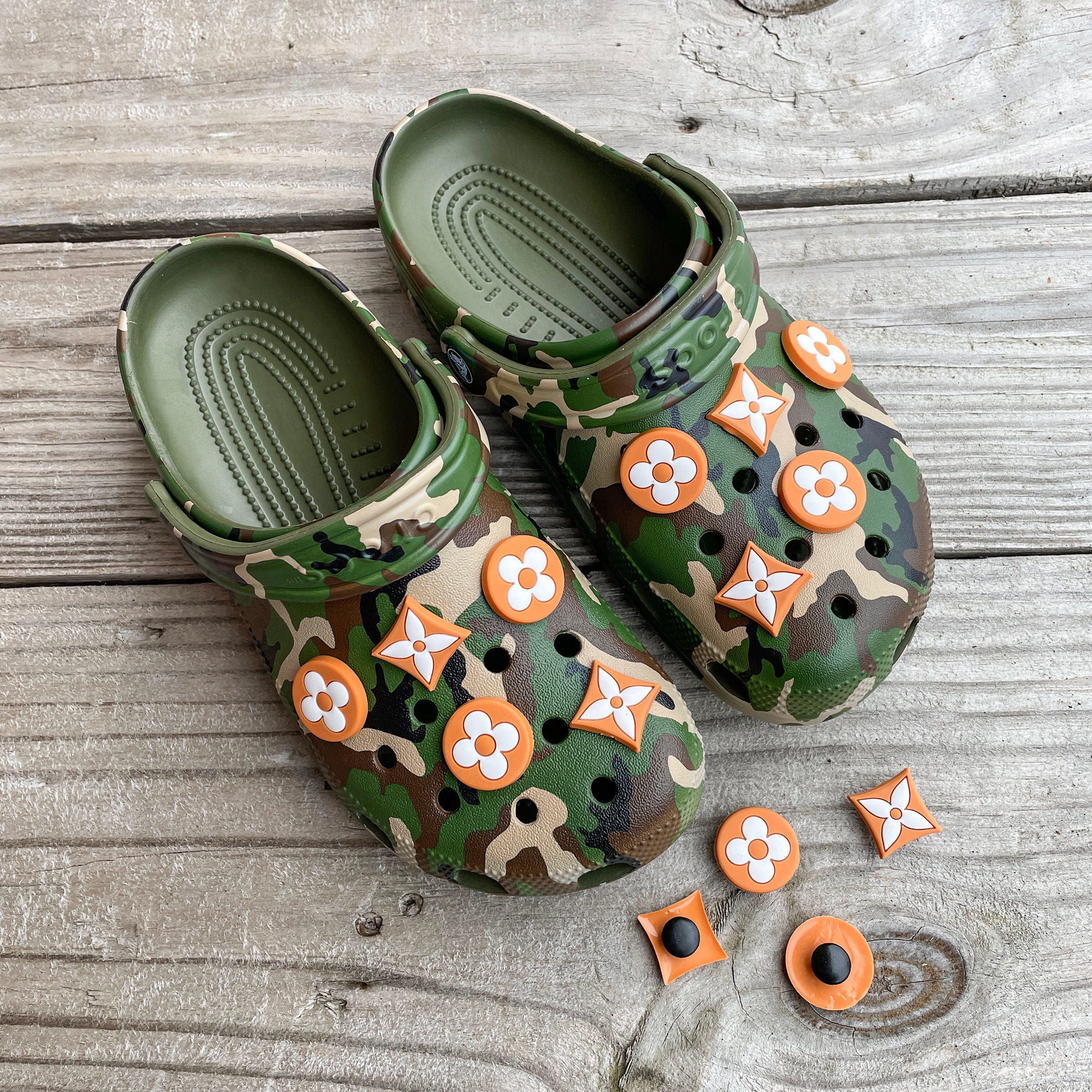 what stores sell charms for crocs