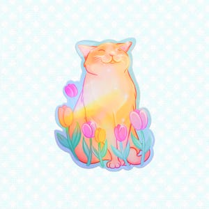 May include: A sticker featuring a smiling orange cat surrounded by pink and yellow tulips. The cat has a light blue outline and is set against a light blue background with a white polka dot pattern. The cat is sitting and appears to be basking in the sun.