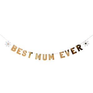 May include: A gold banner with the words "BEST MUM EVER" strung across a white string. The letters are individual and metallic. White daisy accents are on each end of the banner. Perfect for Mother's Day or a birthday.