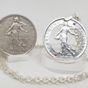 Pendant coin 5 Francs &quot;Sower&quot; in hand-cut silver set with two rubies.