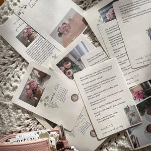 May include: A white ceramic mug with a black handle and the text "But First, Coffee" in a handwritten style. The mug is on a white surface. The mug is approximately 4 inches tall.