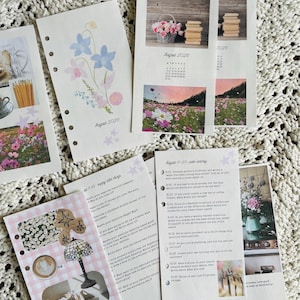 May include: A collection of planner refill pages featuring August 2026 calendars, floral illustrations, and daily journal prompts. The pages include printed photographs of books, flowers, coffee, and lamps, with punched holes along the left side.