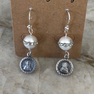 Minimalist pearl earrings with Virgin Mary medallion dangles