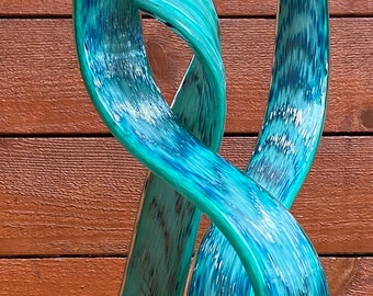 Handmade Teal glass garden leaves spires. Handblown yard art .