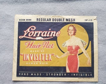 May include: A vintage advertisement for Lorraine Hair Net, made of "InvisiteX" human hair. The ad features a woman in a red dress with a yellow background. The text reads "Medium Brown, Regular Double Mesh, Cap #22, Hand Made, Stronger, Invisible".