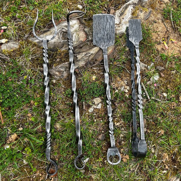 Hand forged 4 piece grill tool set. Spatula w/ bottle opener,BBQ fork,meat turner, and tongs. Spatulas are around 3 1/2” wide.