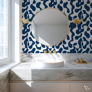 Wallpaper with organic, graphic patterns in brown, pink, purple or blue terracotta colours