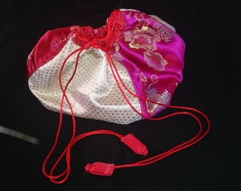 Red and gold brocade drawstring bag
