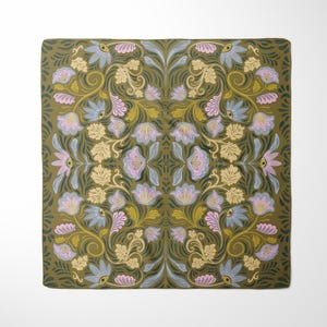 May include: A square green fabric with a floral pattern. The pattern features blue, yellow, and pink flowers with intricate details. The fabric has a vintage aesthetic.