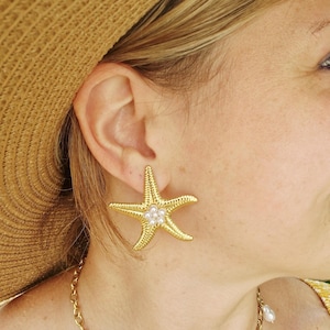 Gold-plated stainless steel and pearl starfish earrings