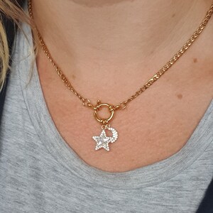 Stainless steel necklace with moon and star charms