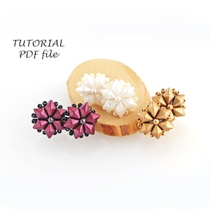 May include: Three pairs of beaded earrings in different colors. The earrings are shaped like stars and are displayed on a wooden surface. The text "TUTORIAL PDF file" is visible in the top left corner of the image.