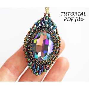 May include: A beaded pendant with a large iridescent crystal in the center. The pendant is surrounded by small beads in shades of green, brown, and purple. The pendant is attached to a gold-colored loop.