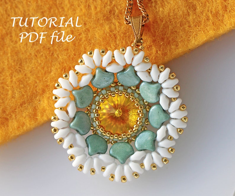 May include: A beaded pendant with a gold chain, featuring a circular design with a yellow center surrounded by green and white beads. The pendant is on a yellow fuzzy surface. The text "TUTORIAL PDF file" is in the top left corner of the image.