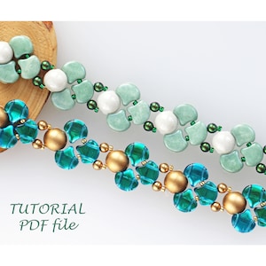 May include: Two beaded bracelets, one with teal and gold beads, the other with green and white beads. The bracelets are on a white background with the text "TUTORIAL PDF file".