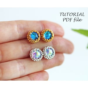 May include: Two pairs of earrings with round blue and iridescent stones surrounded by gold and silver beads.  The earrings are shown on a hand.  The text "TUTORIAL PDF file" is at the top of the image.