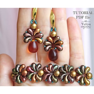 May include: A set of earrings and a bracelet made with brown, gold, and teal seed beads. The earrings feature a teardrop-shaped bead at the bottom. The bracelet is made with a repeating pattern of flower-shaped beads. The image includes the text "TUTORIAL PDF file Yuliya".