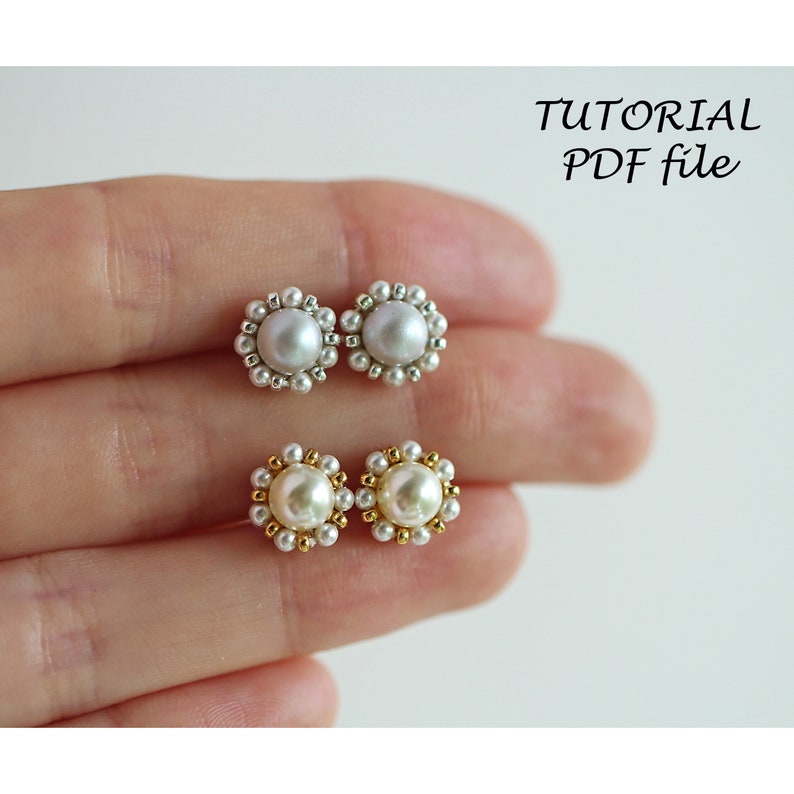 May include: Two pairs of pearl earrings with a beaded halo. The earrings on the left have a silver halo, and the earrings on the right have a gold halo.