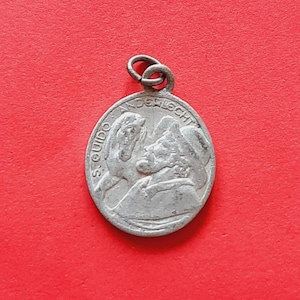 Vintage religious Catholic Belgium aluminum medal pendant of Saint Guido Anderlecht Belgium and Our Lady of Grace